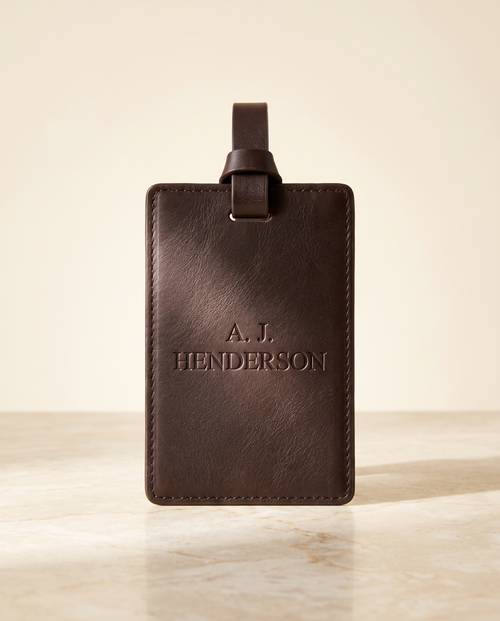 MNSA engraved leather luggage tag, AI-generated product visualization