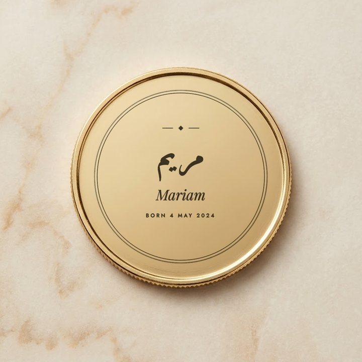 Metal coin engraved with a name, made by MNSA