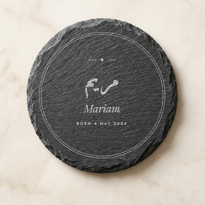 Round rock coaster engraved with a name, made by MNSA