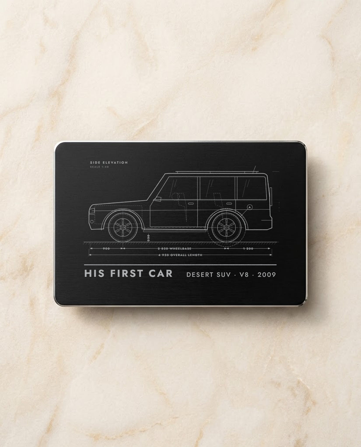 Car blueprint engraved on a black metal card