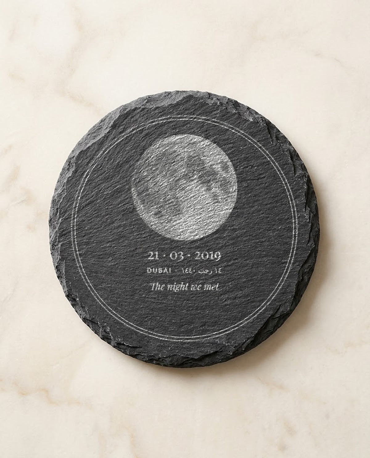 Full moon of 21 March 2019 over Dubai engraved on a round slate coaster