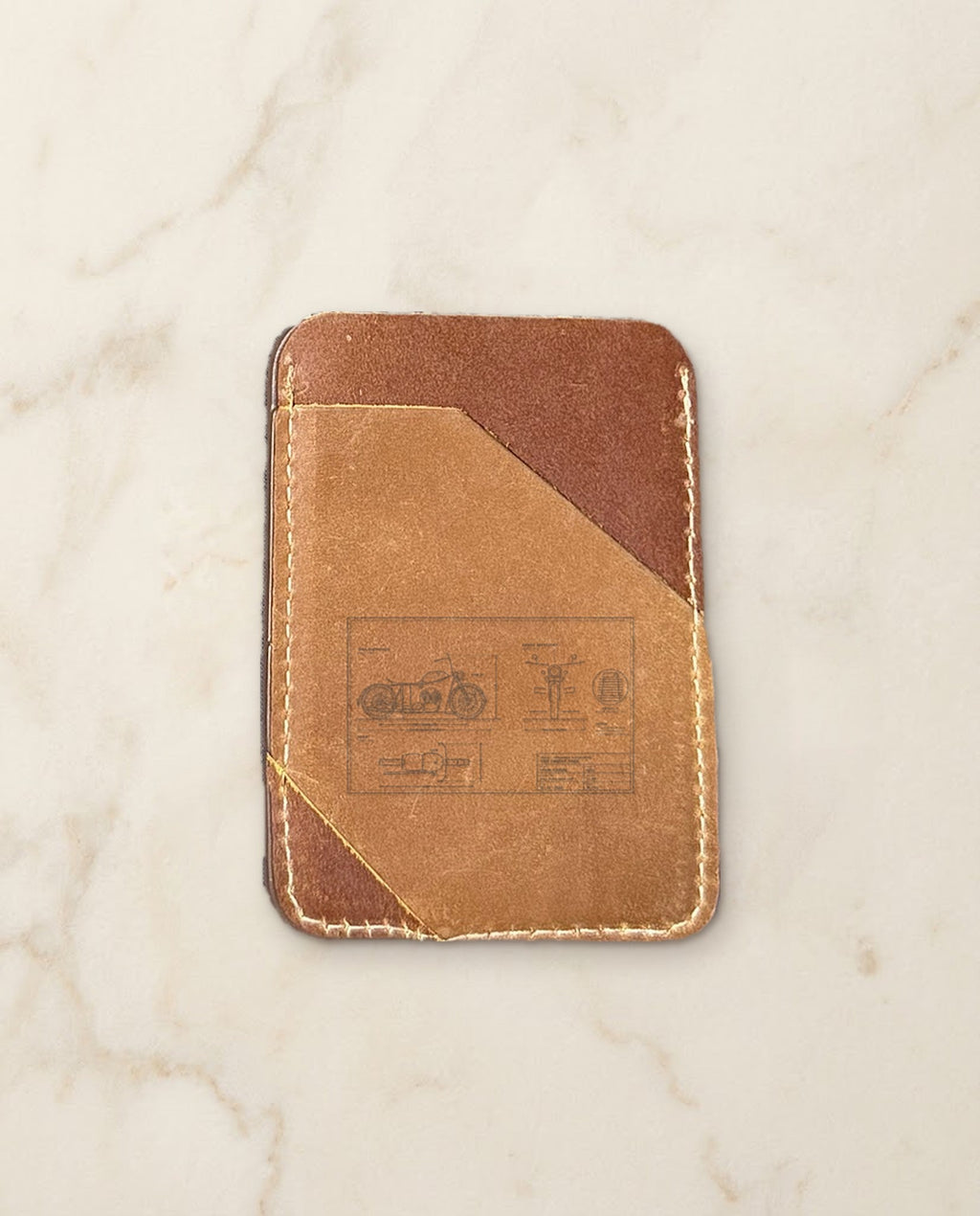 Motorbike blueprint engraved on a chocolate and tan leather card holder