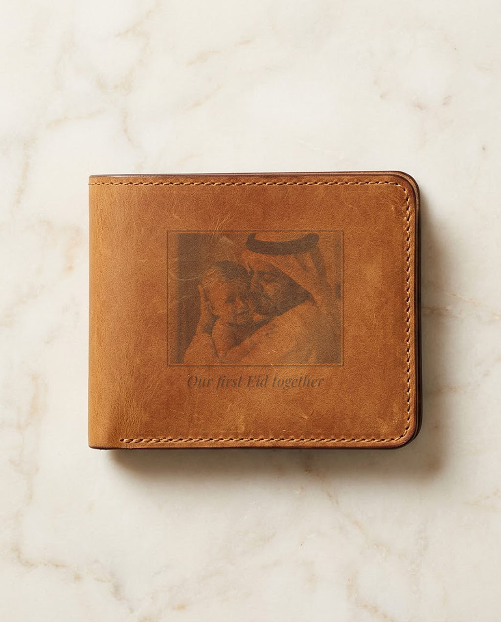 Family photo laser engraved on a tan leather wallet