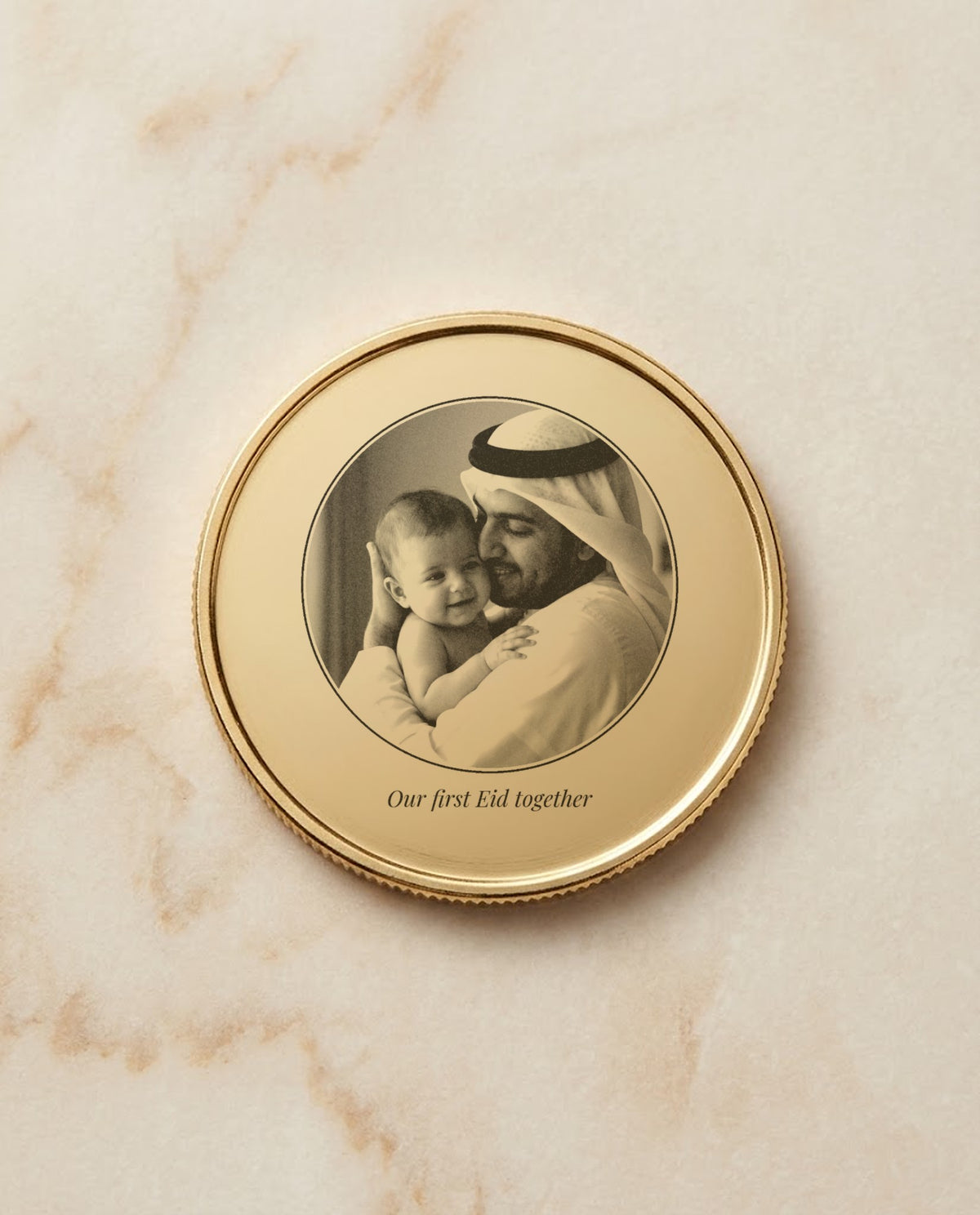 Family photo engraved on a gold metal coin